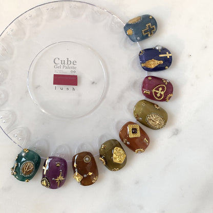 Soft gel palette display with nine embellished swatches around a clear circle