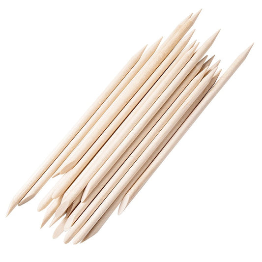 Double-ended pointed wooden nail art sticks in a diagonal bundle