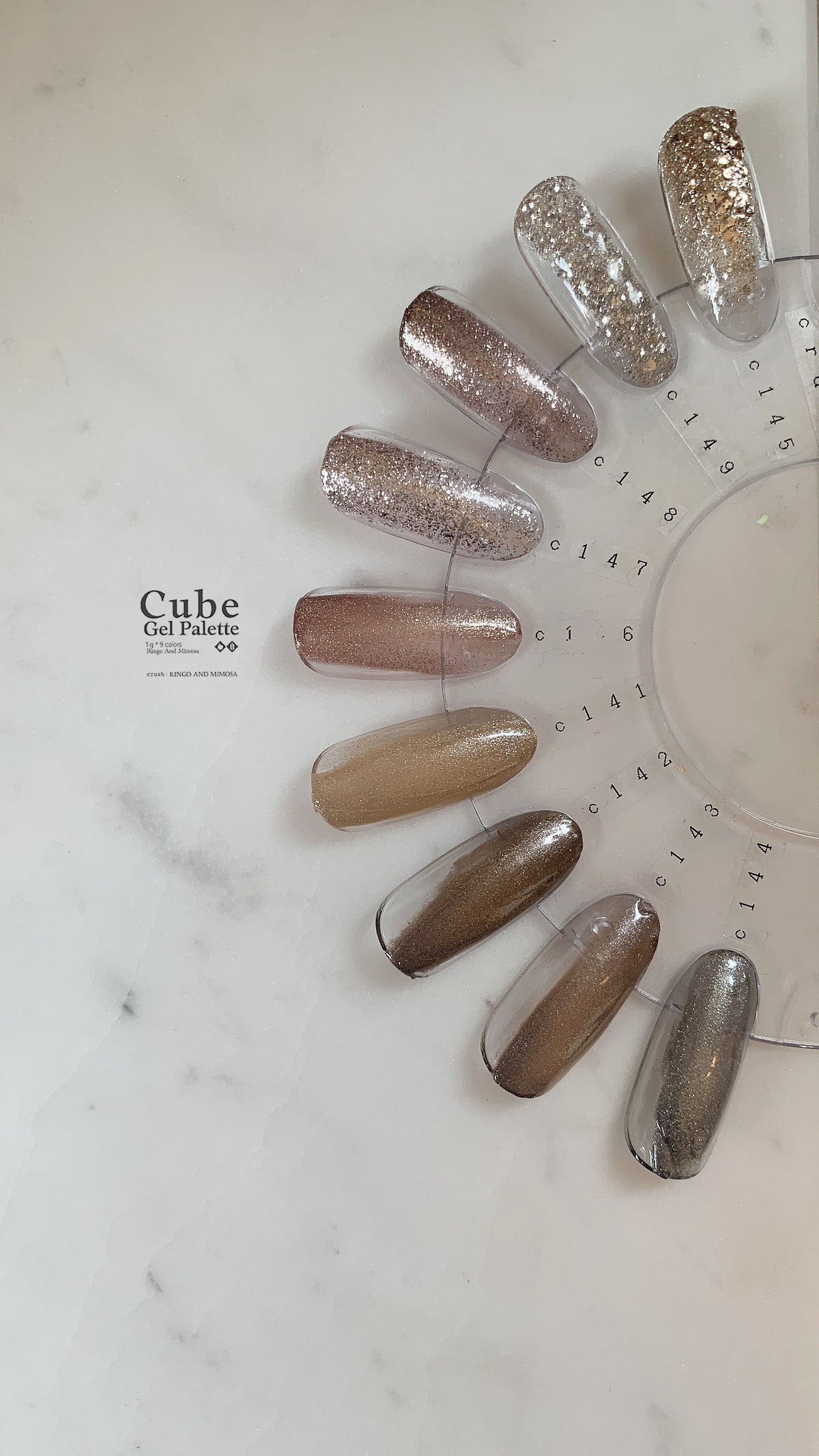 Gel color palette shade chart with neutral metallic and glitter nail tips
