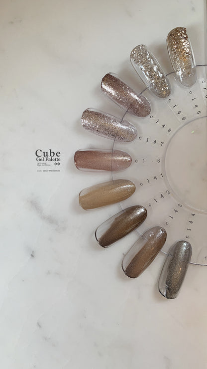 Gel color palette shade chart with neutral metallic and glitter nail tips