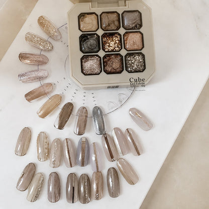 Gel palette with rows of neutral and glitter nail-tip designs