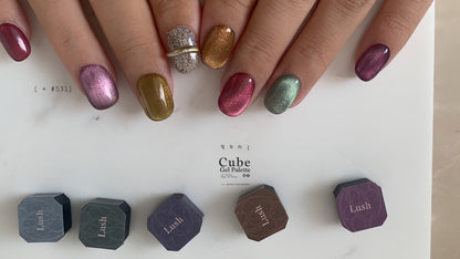 Multicolor soft gel manicure displayed across overlapping hands