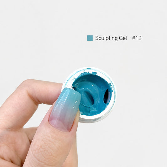 YHH Patting Painting Chrome-Rubbable Pot Gel 5g, shade P12 – bright blue gel in an open pot beside a painted nail.