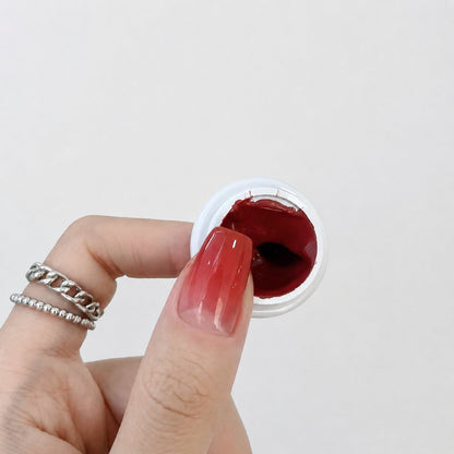 YHH Patting Painting Chrome-Rubbable Pot Gel 5g, shade P27 – red gel pot with dark marbled texture and painted nail swatch.