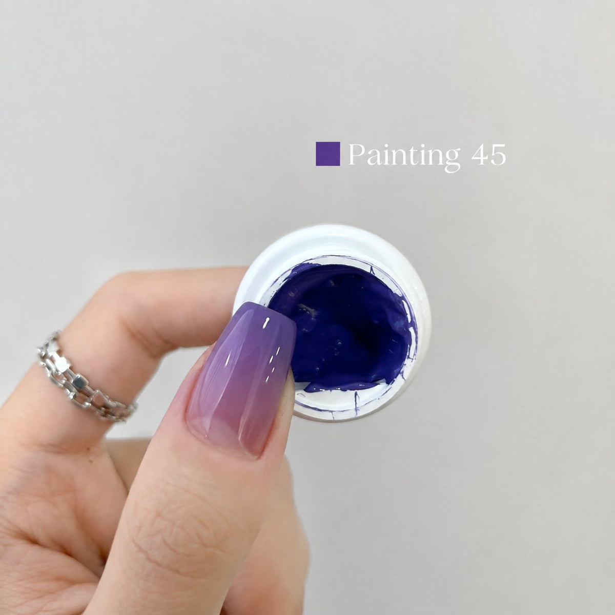 YHH Patting Painting Chrome-Rubbable Pot Gel 5g, shade P45 – royal-blue gel pot with painted nail swatch.